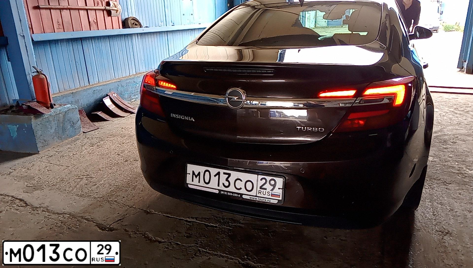 Фото автомобиля OPEL INSIGNIA, 2014 — госномер М013СО29. Цвет: КОРИЧНЕВЫЙ