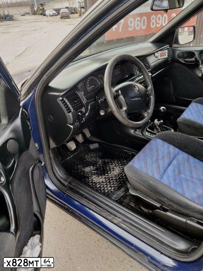 Фото автомобиля OPEL VECTRA, 1998 — госномер Р057КТ68. Цвет: ТЕМНО СИНИЙ