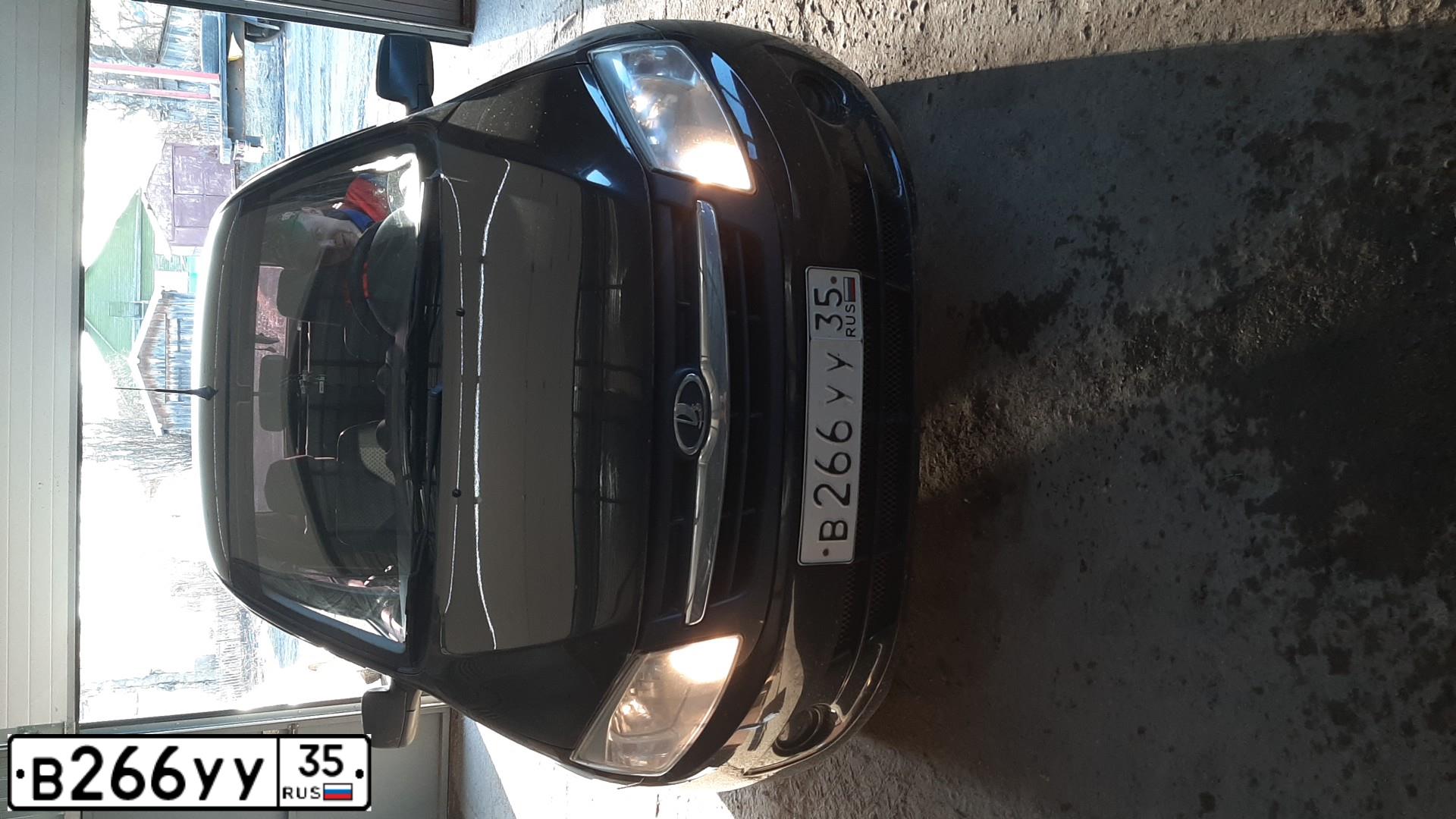 Фото автомобиля LADA 2190 GRANTA, 2012 — госномер В266УУ35. Цвет: Сине-Черный