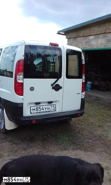 Фото автомобиля FIAT DOBLO, 2008 — госномер Т170НТ750. Цвет: Белый
