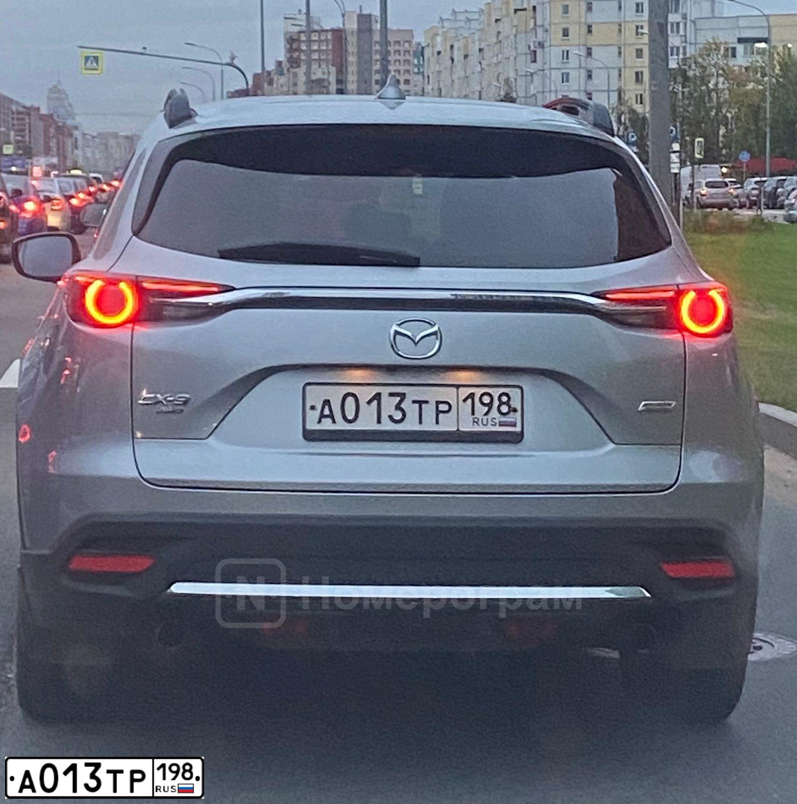 Фото автомобиля MAZDA CX-9, 2018 — госномер А013ТР198. Цвет: серый