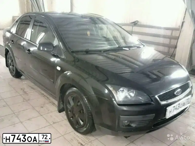 Фото автомобиля FORD FOCUS, 2006 — госномер Т446ЕС72. Цвет: ЧЕРНЫЙ