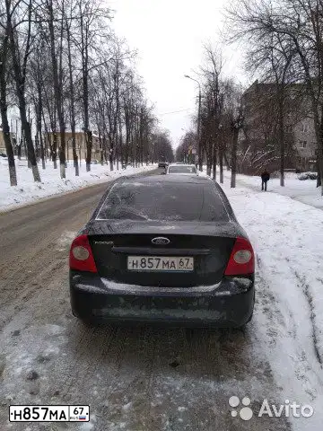 Фото автомобиля FORD FOCUS, 2010 — госномер Н857МА67. Цвет: ЧЕРНЫЙ