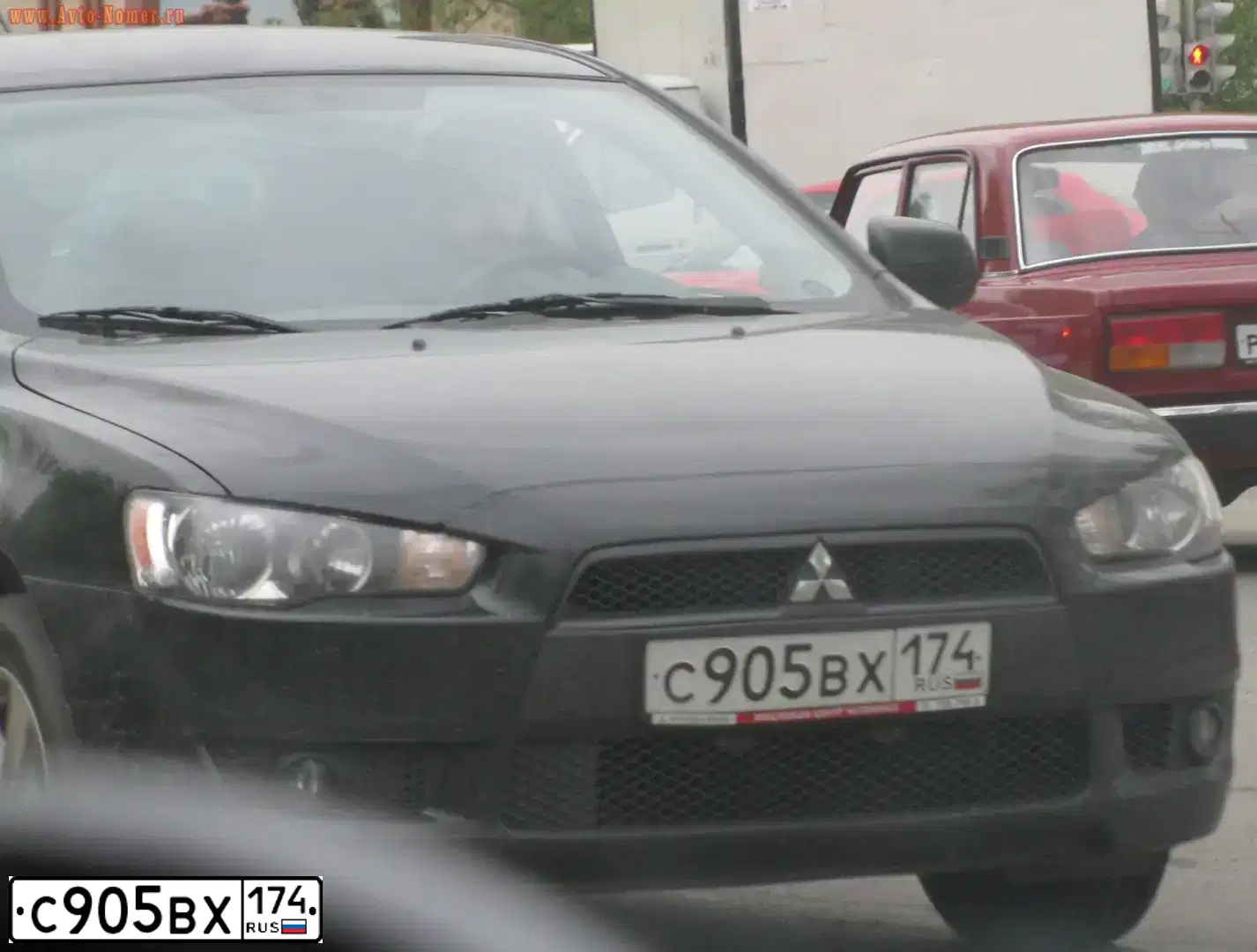 Фото автомобиля MITSUBISHI LANCER, 2008 — госномер С905ВХ174. Цвет: ЧЕРНЫЙ