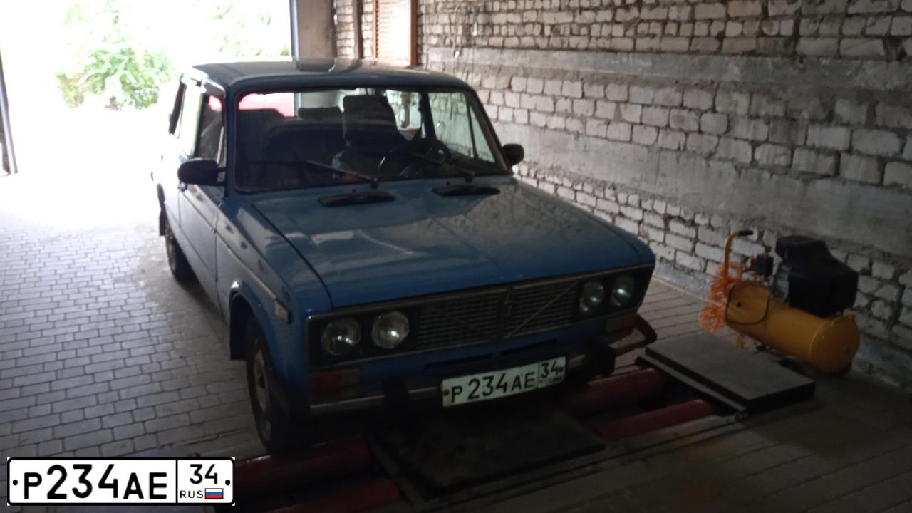 Фото автомобиля LADA 2106, 1990 — госномер Р234АЕ34. Цвет: СЕРО ГОЛУБОЙ