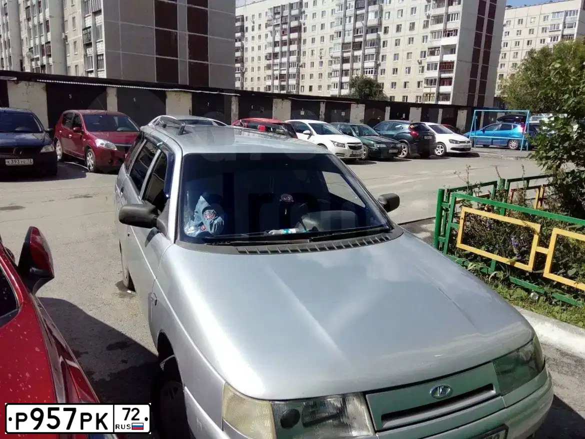 Фото автомобиля LADA 2111, 2001 — госномер Р957РК72. Цвет: серебристый