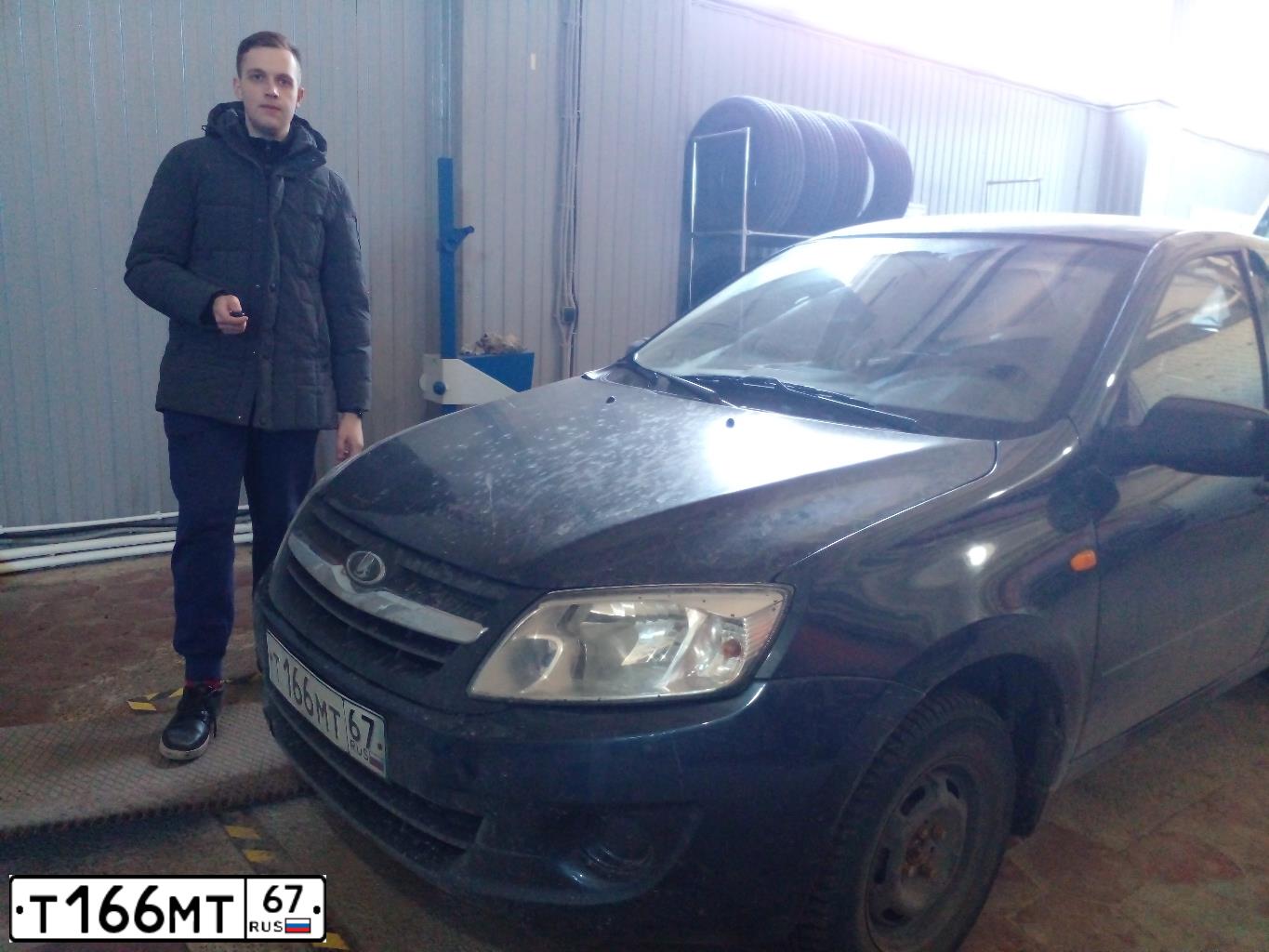 Фото автомобиля LADA 2190 GRANTA, 2012 — госномер Т166МТ67. Цвет: СЕРО-СИНИЙ