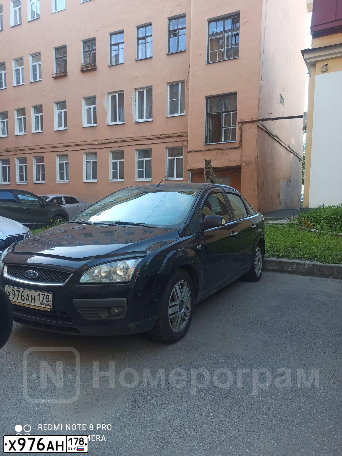 Фото автомобиля FORD FOCUS, 2006 — госномер У243РТ48. Цвет: ЧЕРНЫЙ