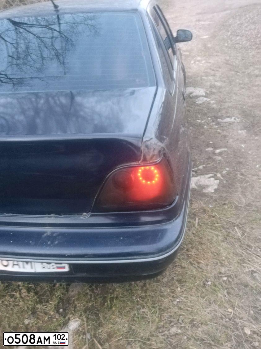 Фото автомобиля DAEWOO NEXIA, 2006 — госномер О508АМ102. Цвет: ТЕМНО-СЕРЫЙ