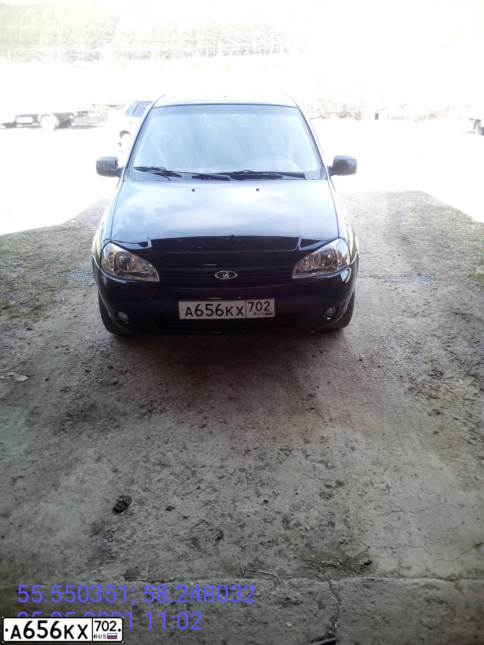 Фото автомобиля LADA 1117 KALINA, 2011 — госномер А656КХ702. Цвет: Сине-Черный