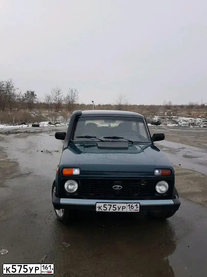 Фото автомобиля LADA 2121 NIVA, 2010 — госномер Р086АЕ180. Цвет: Темно-зеленый