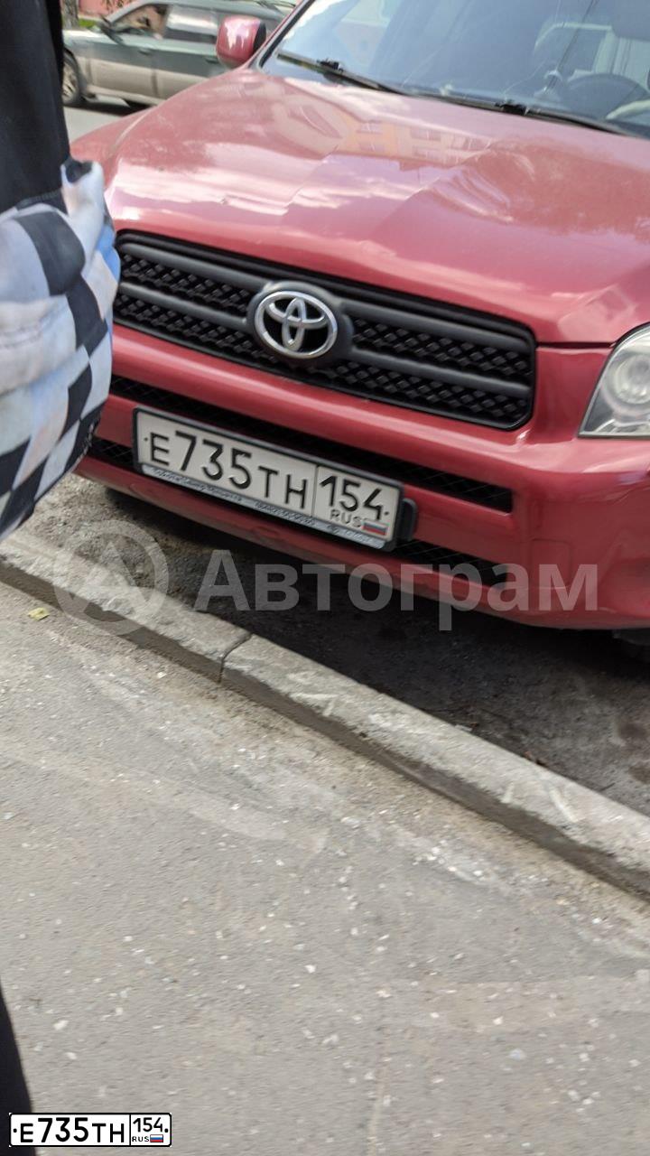 Фото автомобиля TOYOTA RAV4, 2006 — госномер Е735ТН154. Цвет: Красный