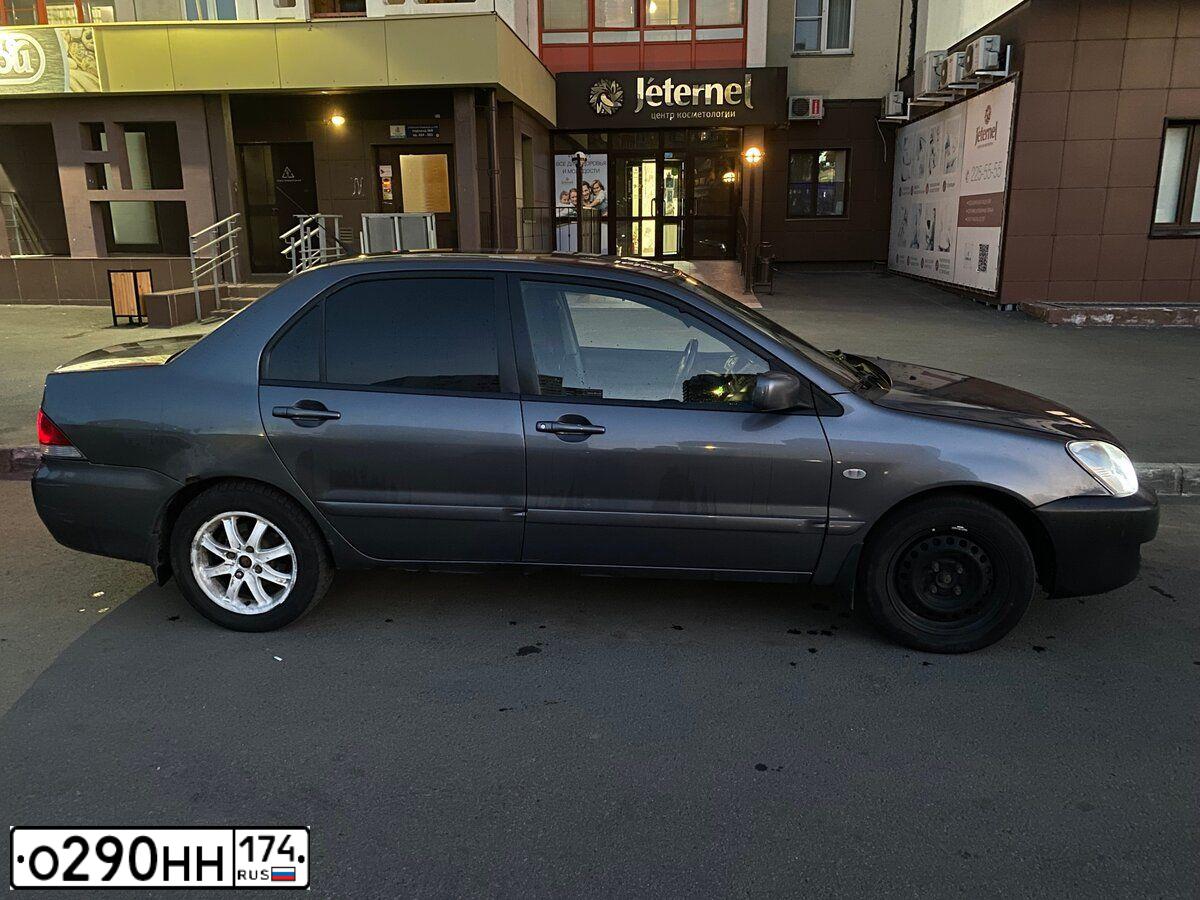 Фото автомобиля FORD FOCUS, 2007 — госномер О290НН174. Цвет: Темно-синий