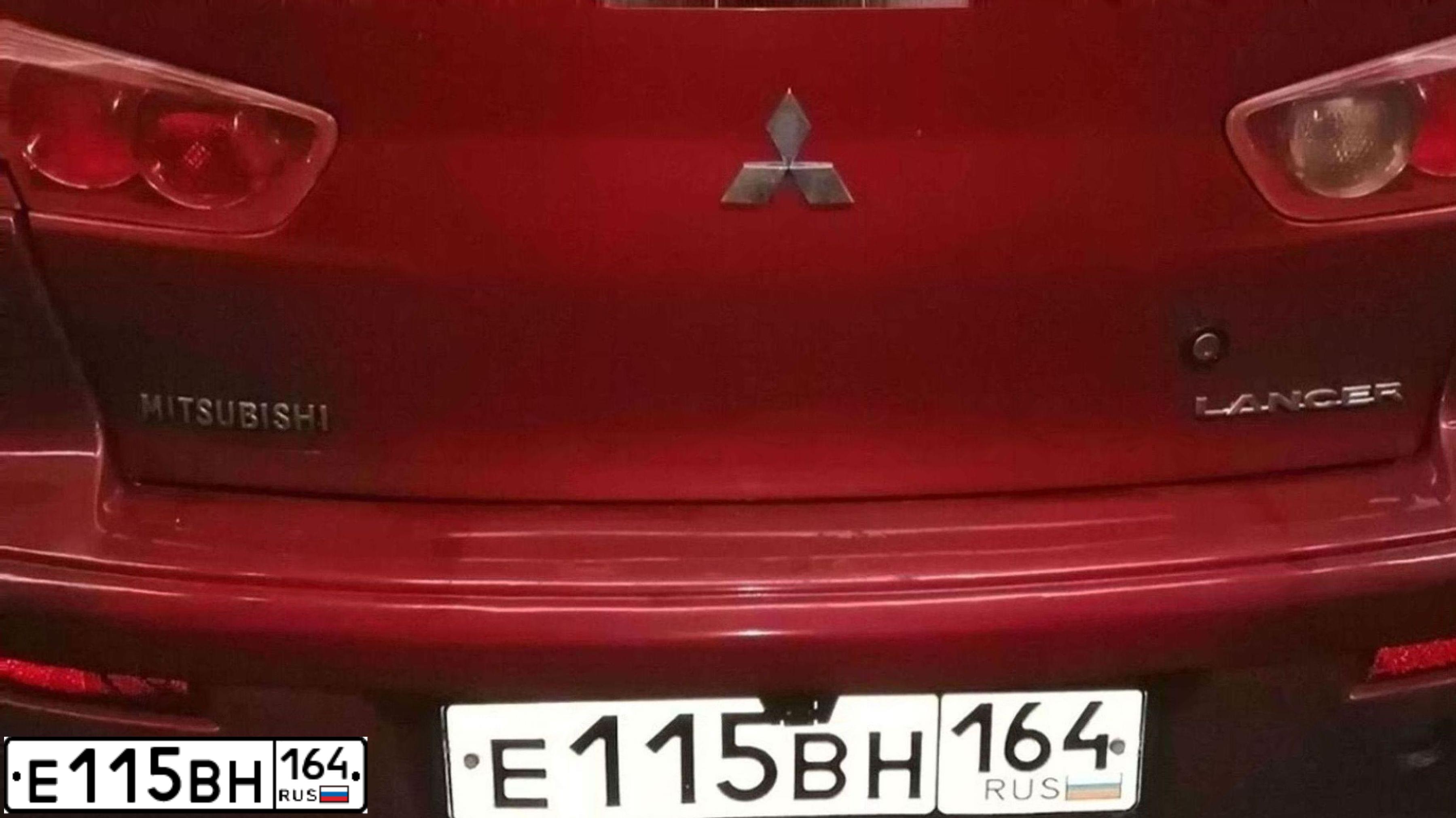Фото автомобиля MITSUBISHI LANCER, 2007 — госномер Е115ВН164. Цвет: Красный