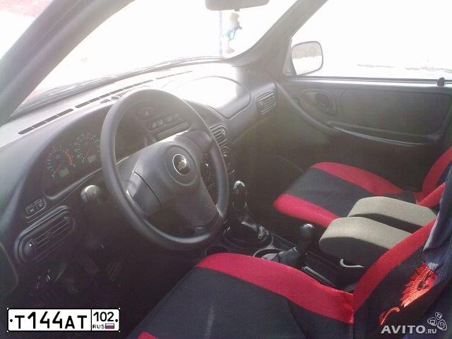 Фото автомобиля CHEVROLET NIVA, 2010 — госномер С797СВ102. Цвет: ЧЕРНО-СИНИЙ МЕТАЛЛИК