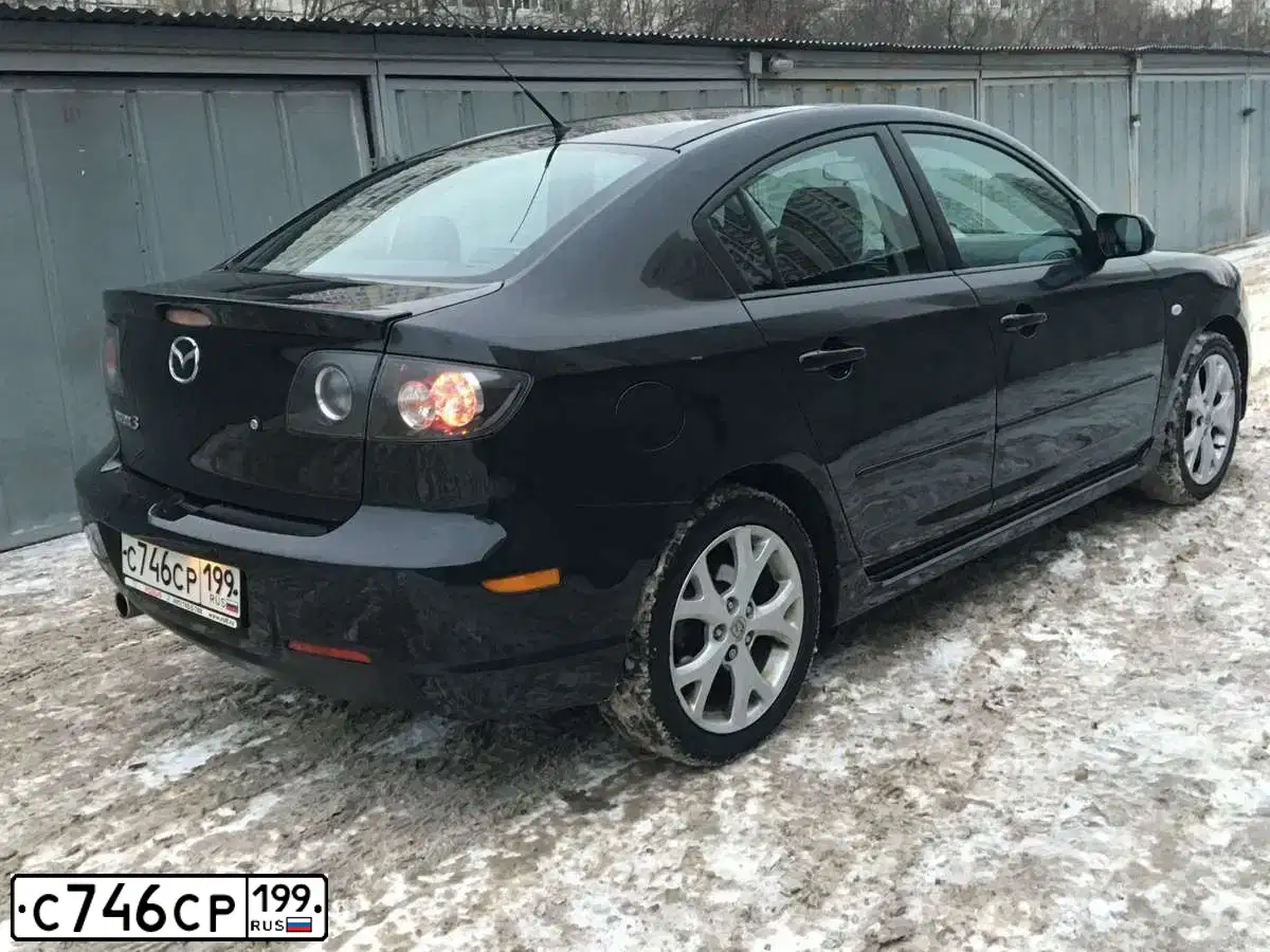 Фото автомобиля MAZDA 3, 2008 — госномер М569УР750. Цвет: ЧЕРНЫЙ