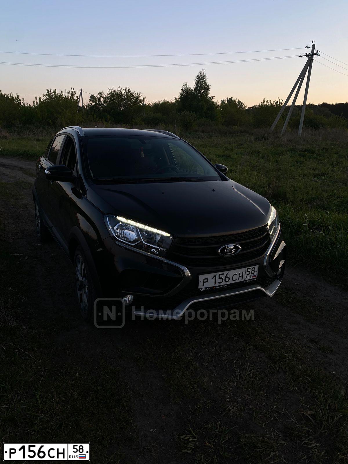 Фото автомобиля LADA XRAY, 2018 — госномер Р156СН58. Цвет: ЧЕРНЫЙ