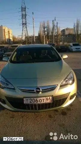 Фото автомобиля OPEL ASTRA, 2012 — госномер Т206ОТ64. Цвет: СЕРЫЙ