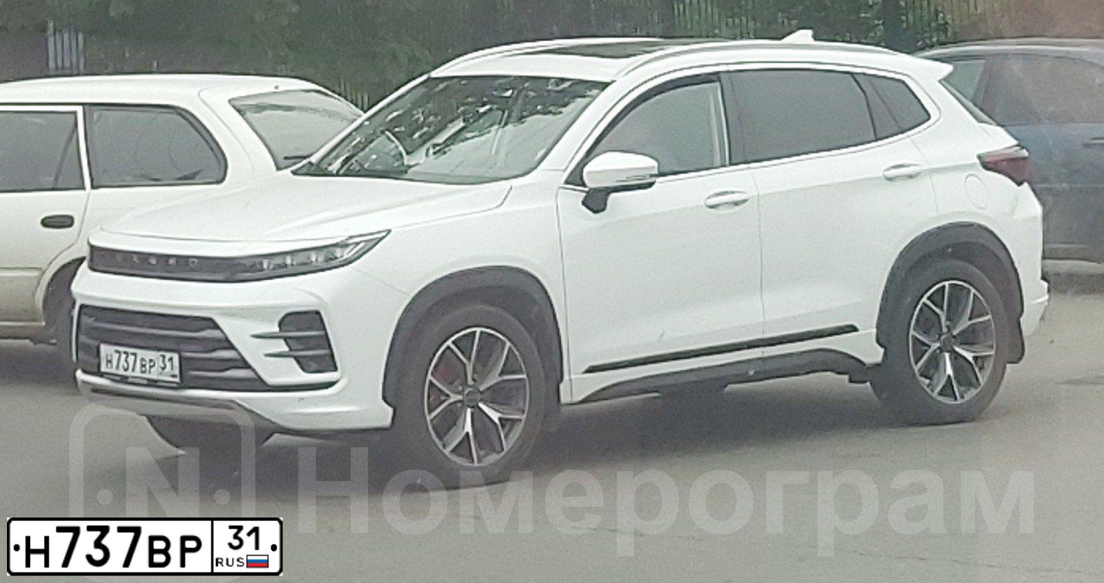 Фото автомобиля KIA RIO, 2012 — госномер Н737ВР31. Цвет: Серебристый