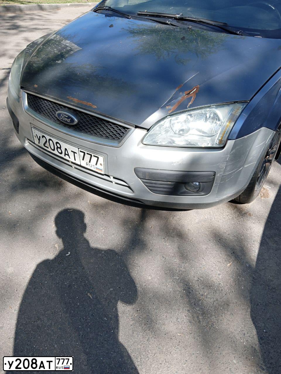 Фото автомобиля FORD FOCUS, 2005 — госномер Х418СР71. Цвет: голубой