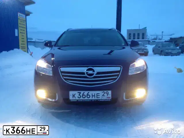 Фото автомобиля OPEL INSIGNIA, 2011 — госномер К366НЕ29. Цвет: синий
