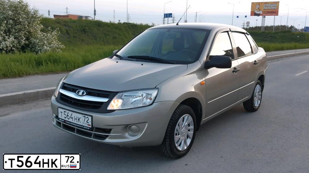 Фото автомобиля LADA 2190 GRANTA, 2013 — госномер Т564НК72. Цвет: СЕРО-БЕЖЕВЫЙ