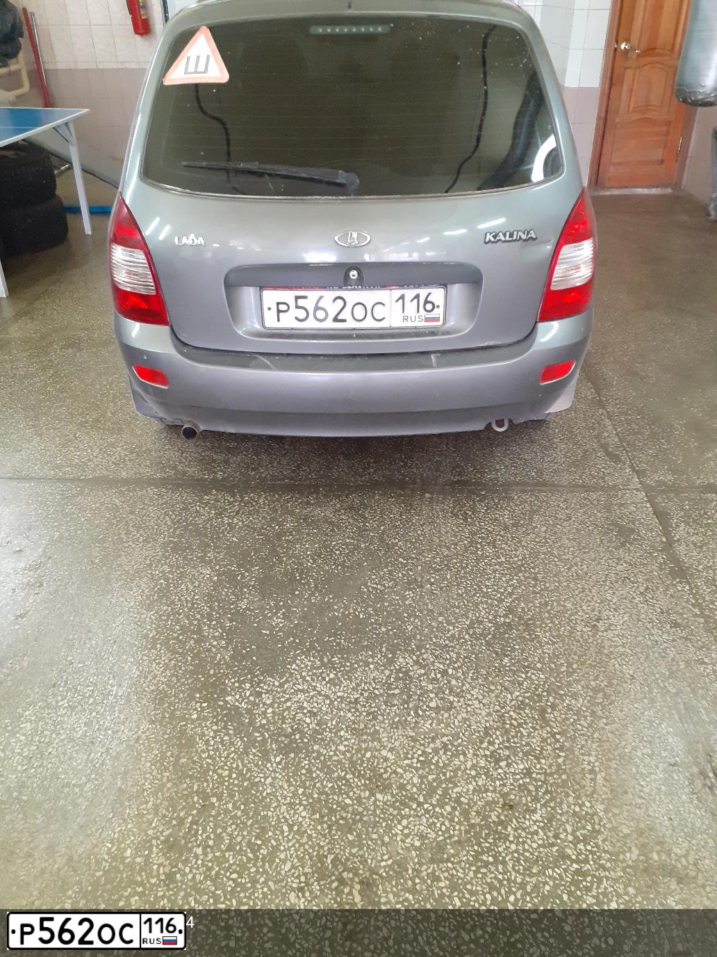 Фото автомобиля LADA 1117 KALINA, 2012 — госномер Р562ОС116. Цвет: Темно-серый металлик