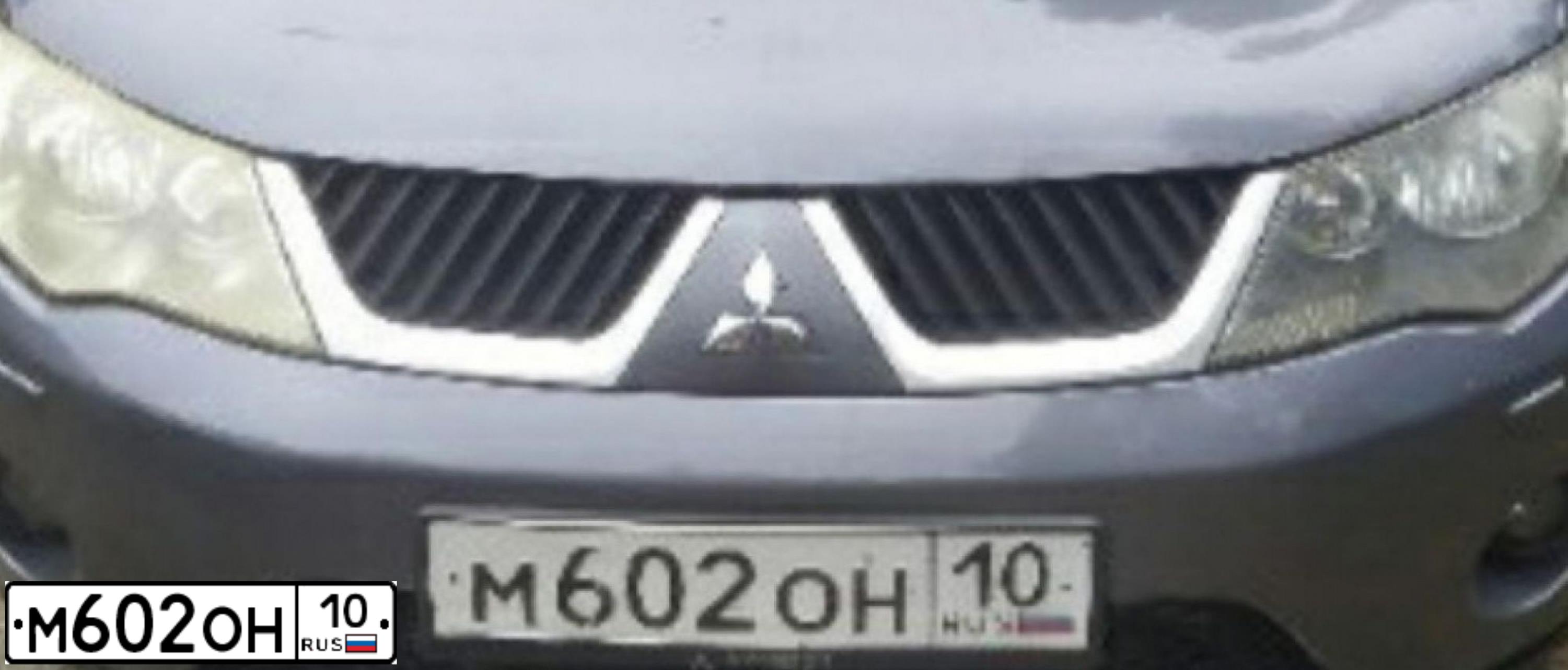 Фото автомобиля MITSUBISHI OUTLANDER, 2007 — госномер К646ТТ10. Цвет: СЕРЫЙ