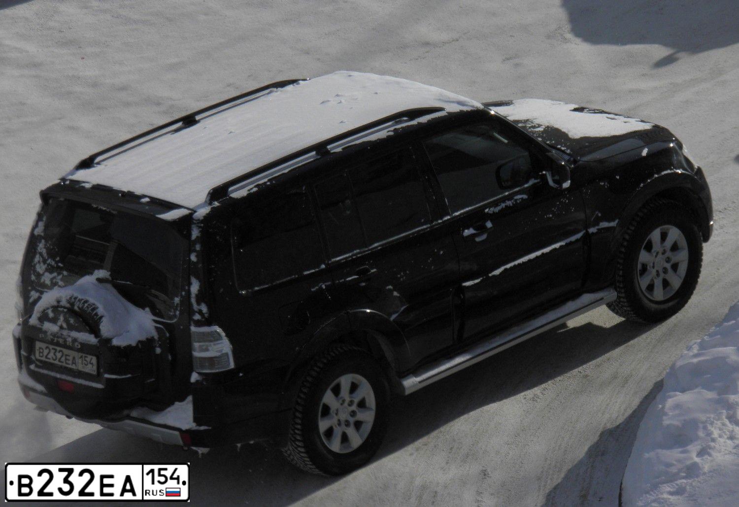 Фото автомобиля MITSUBISHI PAJERO, 2011 — госномер Р207ВР977. Цвет: ЧЕРНЫЙ