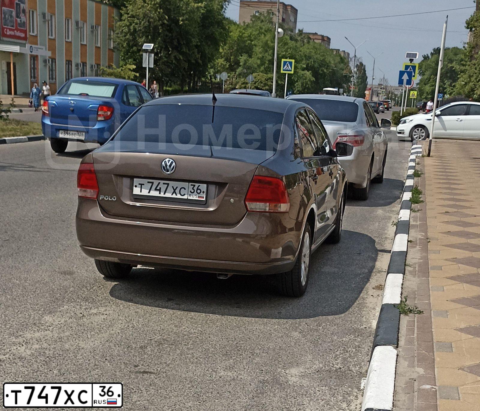 Фото автомобиля VOLKSWAGEN POLO, 2014 — госномер Р033НК48. Цвет: КОРИЧНЕВЫЙ
