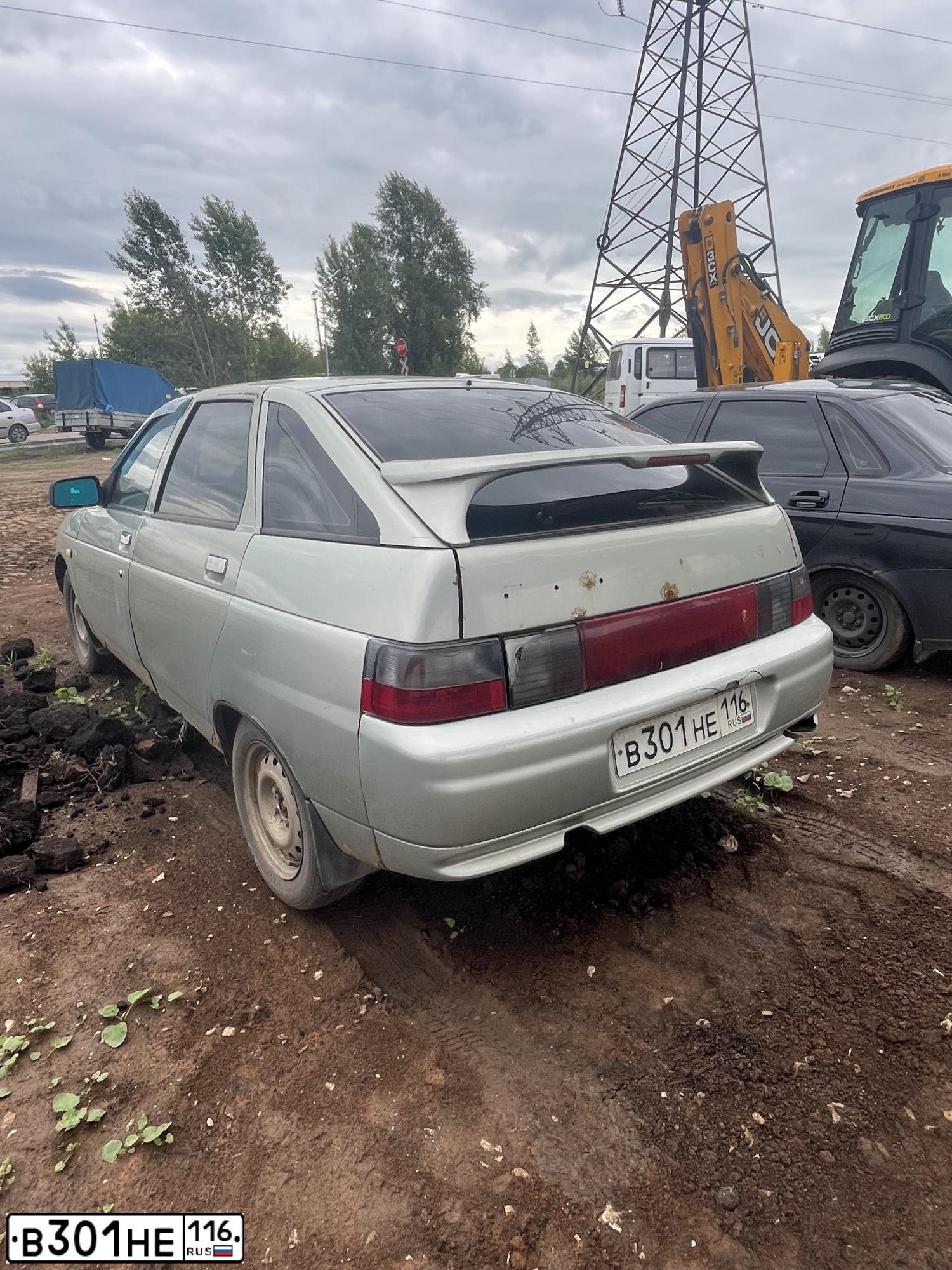 Фото автомобиля LADA 2112, 2006 — госномер В301НЕ116. Цвет: БЕЛО-ЗЕЛЕНЫЙ