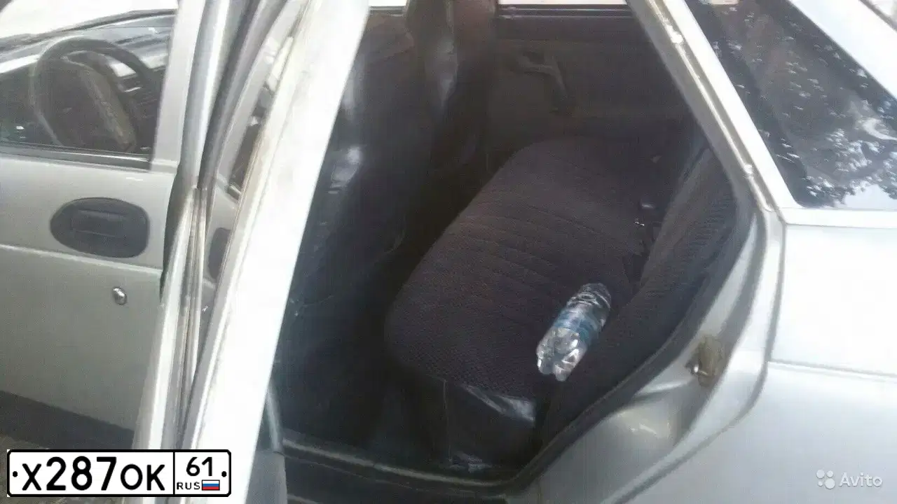 Фото автомобиля LADA 2110, 2001 — госномер Е066НН761. Цвет: Светло-Серебристый металлик