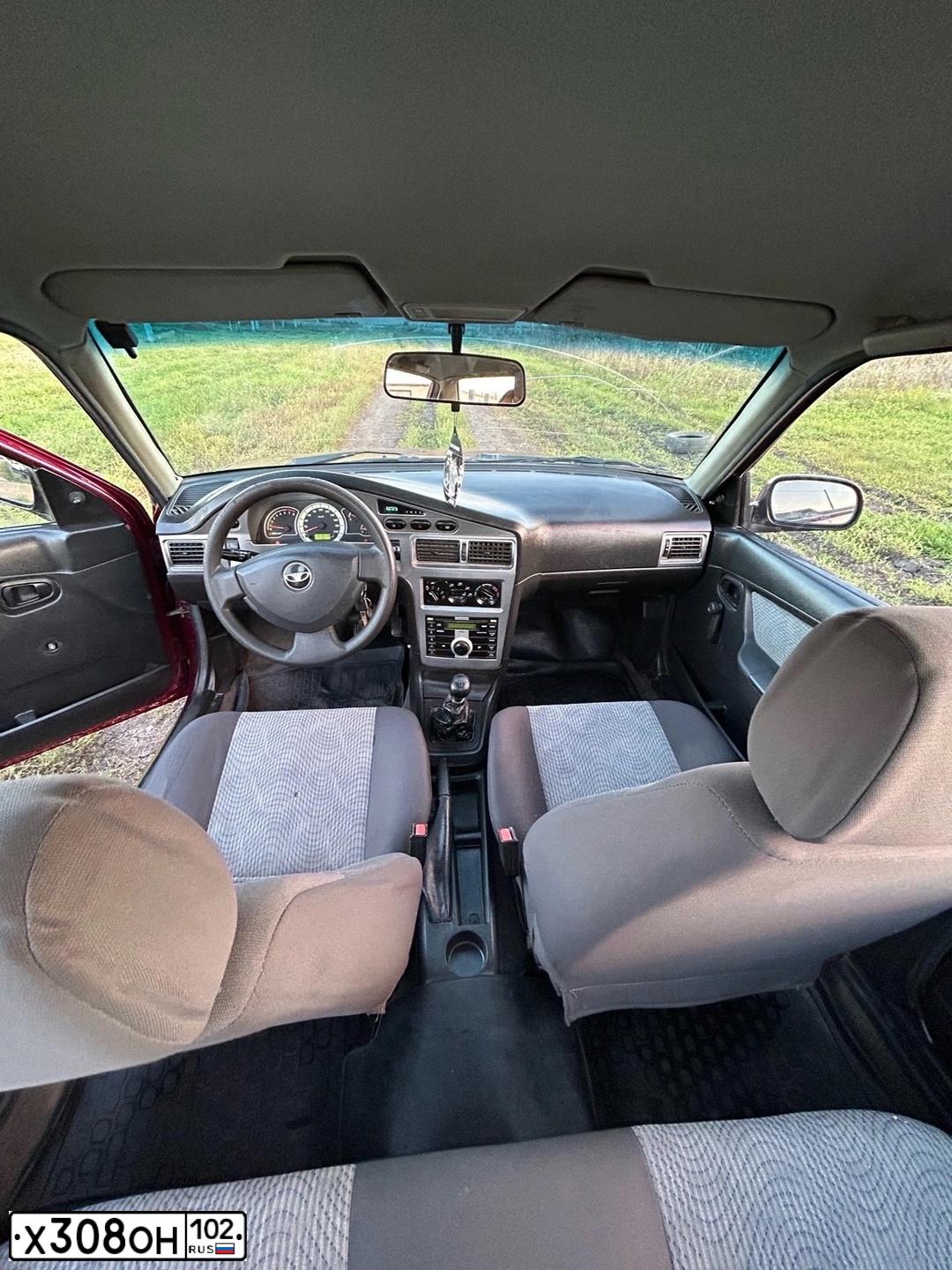 Фото автомобиля DAEWOO NEXIA, 2008 — госномер М070РК702. Цвет: БОРДОВЫЙ