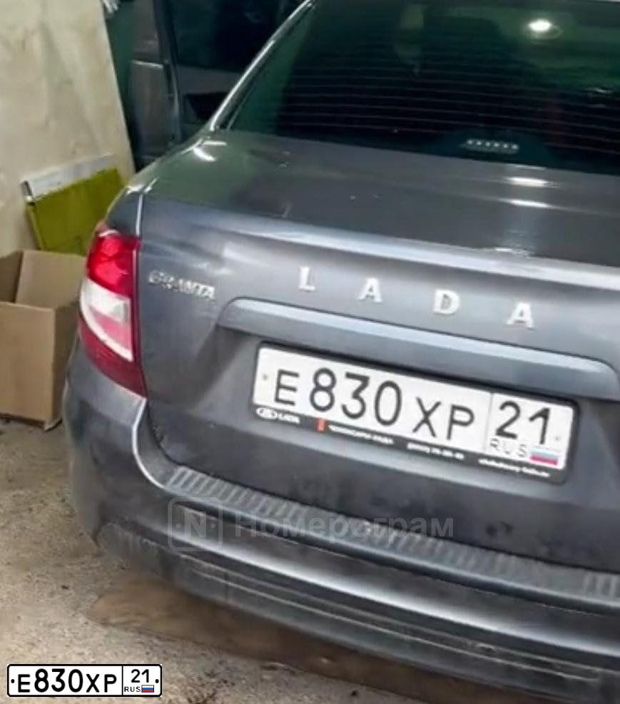 Фото автомобиля LADA 2190 GRANTA, 2018 — госномер Е830ХР21. Цвет: СЕРЕБРИСТО-ТЕМНО-СЕРЫЙ