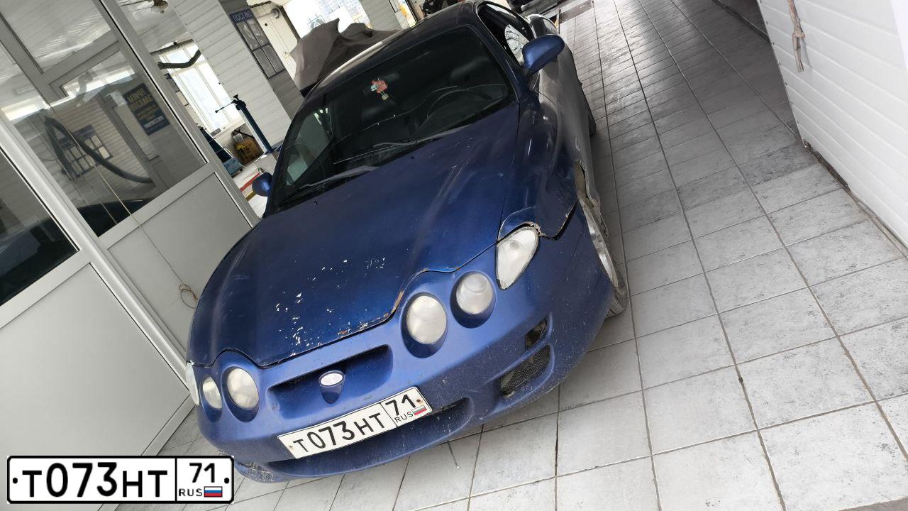 Фото автомобиля HYUNDAI TIBURON, 1999 — госномер Т073НТ71. Цвет: СИНИЙ