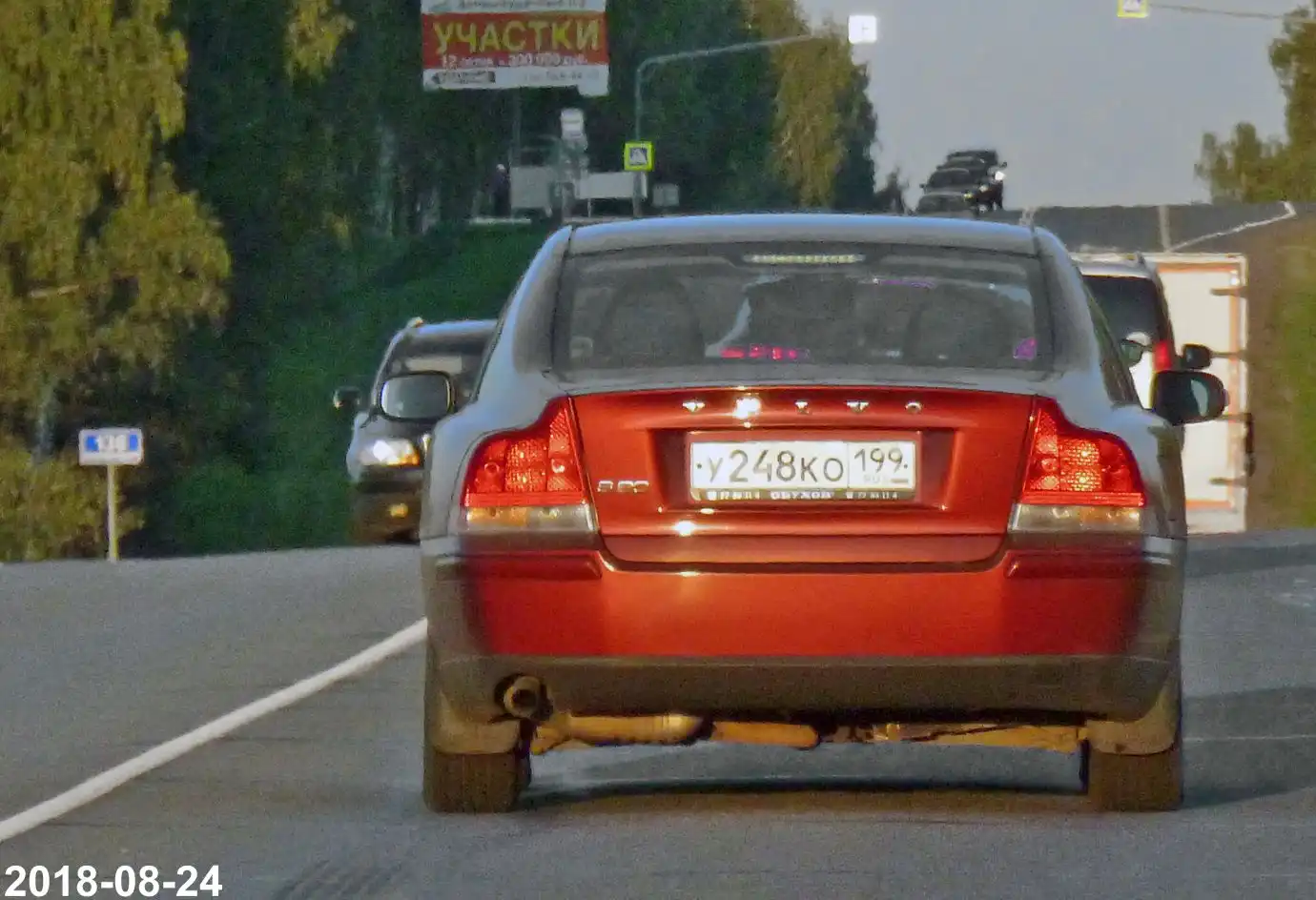 Фото автомобиля VOLVO S60, 2008 — госномер У248КО199. Цвет: КРАСНЫЙ