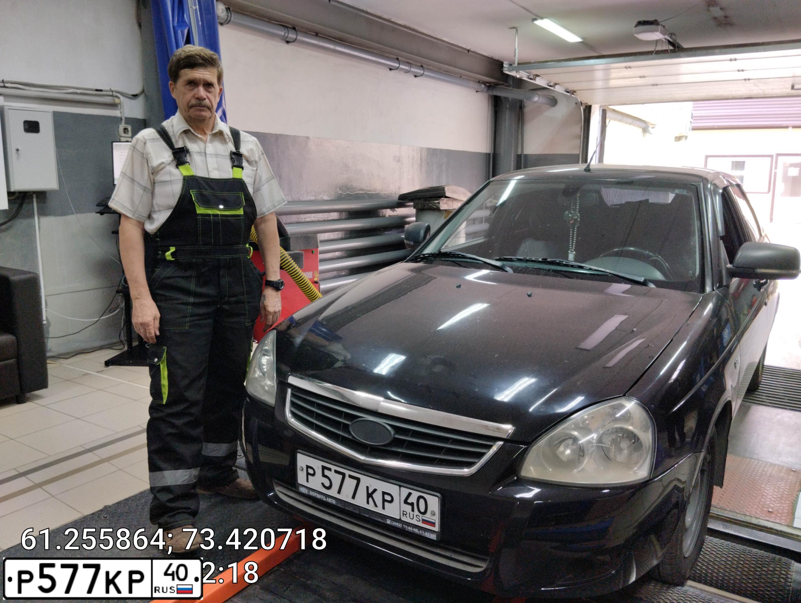 Фото автомобиля LADA PRIORA, 2012 — госномер Е427РР186. Цвет: СИНЕ-ЧЕРНЫЙ