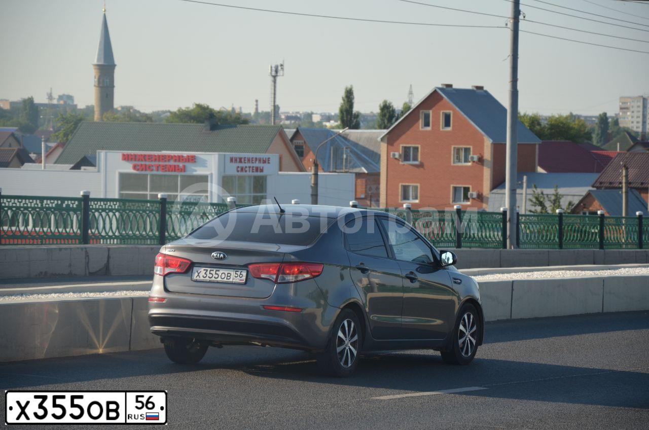 Фото автомобиля KIA RIO, 2015 — госномер Х355ОВ56. Цвет: ТЕМНО-СЕРЫЙ