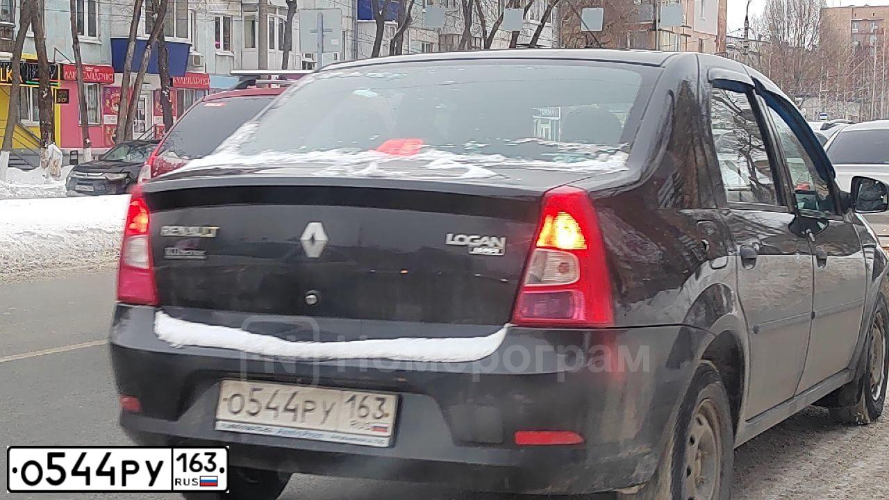 Фото автомобиля RENAULT LOGAN, 2011 — госномер О544РУ163. Цвет: ЧЕРНЫЙ
