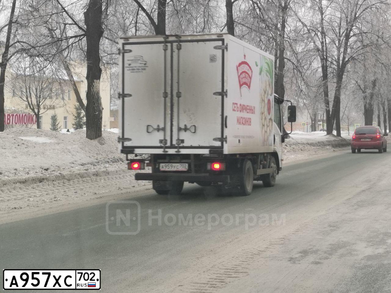 Фото автомобиля TOYOTA RAV4, 2009 — госномер А957ХС702. Цвет: ЧЕРНЫЙ