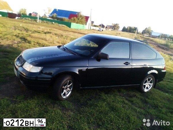 Фото автомобиля LADA 2112, 2009 — госномер В294НТ702. Цвет: Темно-зеленый