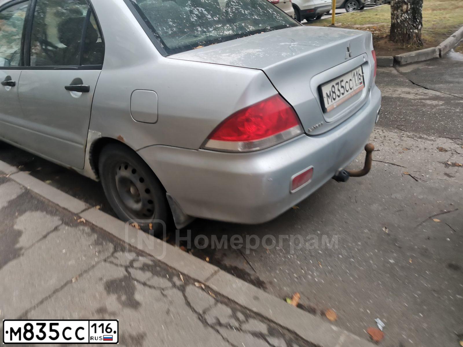 Фото автомобиля MITSUBISHI LANCER, 2003 — госномер Т595РН73