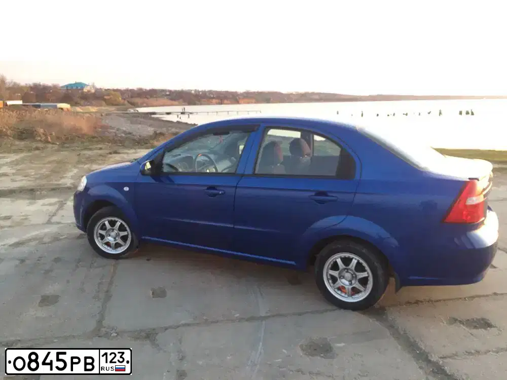 Фото автомобиля CHEVROLET AVEO, 2010 — госномер А153ХУ123. Цвет: синий