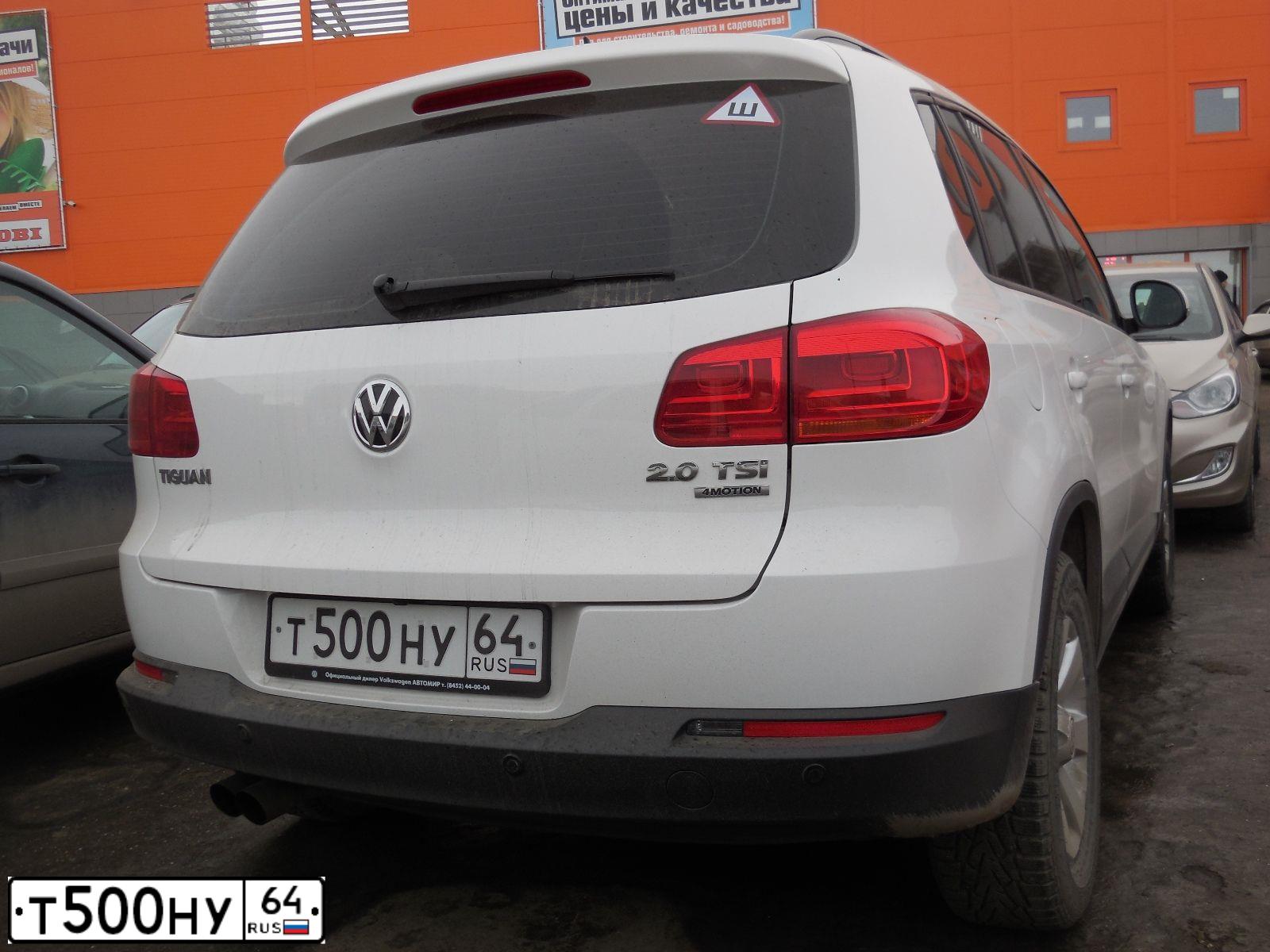 Фото автомобиля VOLKSWAGEN TIGUAN, 2013 — госномер Е076ВС164. Цвет: Белый
