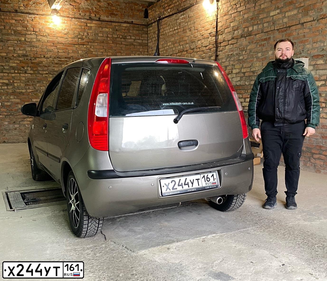 Фото автомобиля MITSUBISHI COLT, 2007 — госномер Х244УТ161. Цвет: СЕРЫЙ