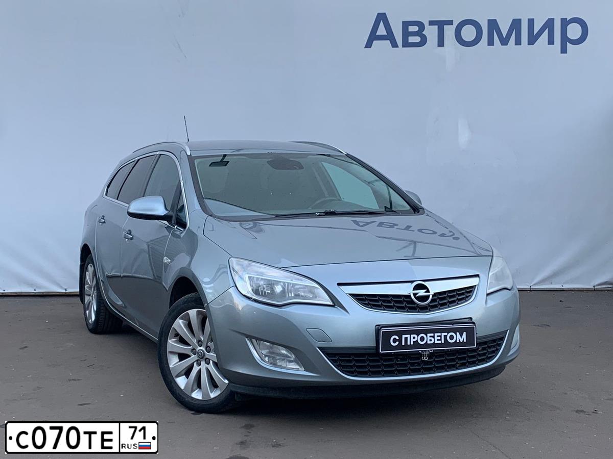 Фото автомобиля OPEL ASTRA, 2012 — госномер К711НВ797. Цвет: СЕРЫЙ