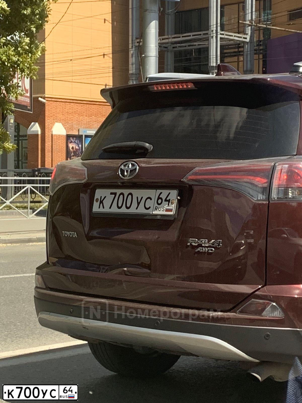 Фото автомобиля TOYOTA RAV4, 2016 — госномер К700УС64. Цвет: ТЕМНО-КРАСНЫЙ