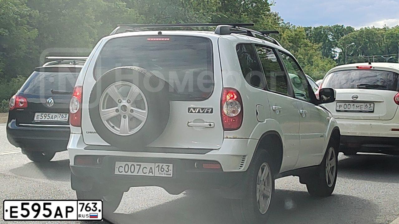 Фото автомобиля VOLKSWAGEN PASSAT, 2009 — госномер Е595АР763. Цвет: ЧЕРНЫЙ
