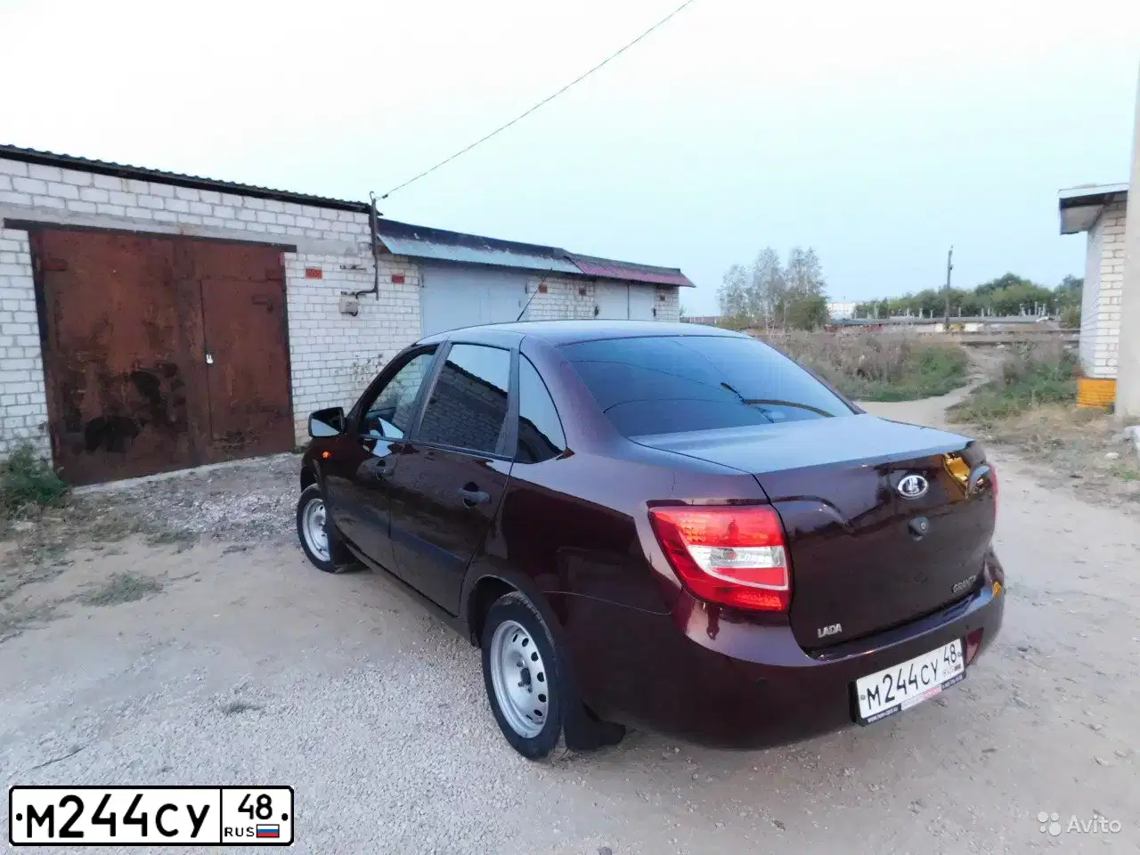 Фото автомобиля LADA 2190 GRANTA, 2014 — госномер Н829АХ181. Цвет: ТЕМНО-ВИШНЕВЫЙ