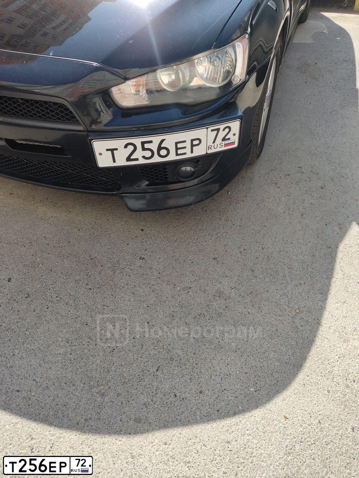 Фото автомобиля MITSUBISHI LANCER, 2008 — госномер Т256ЕР72. Цвет: ЧЕРНЫЙ